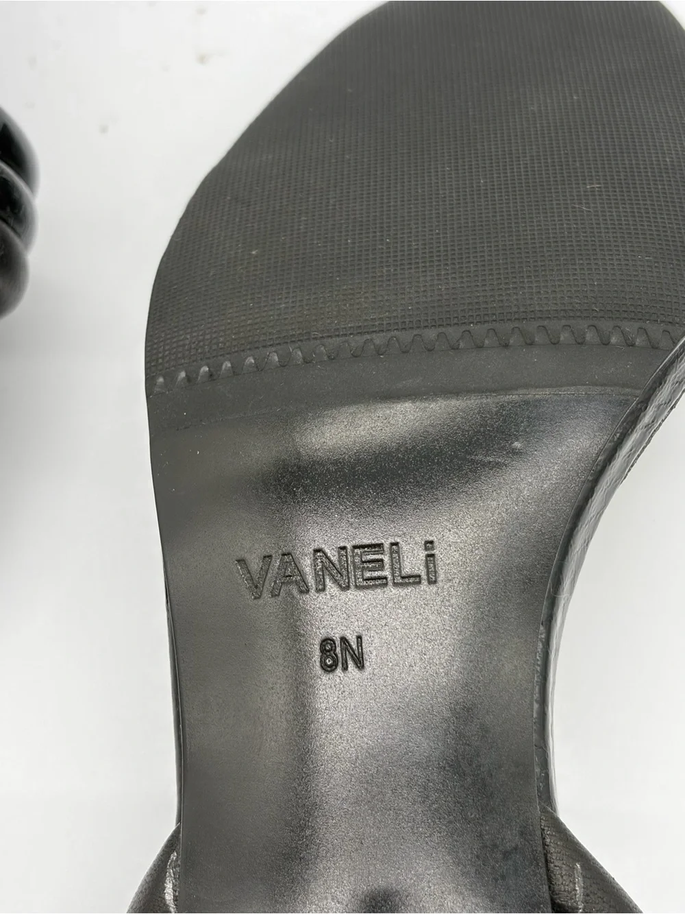Vaneli Black Twisted Strap Mid-Heel Sandals